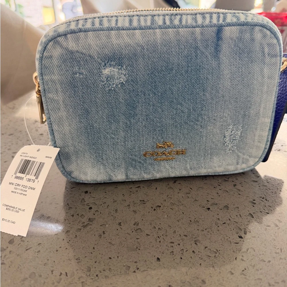Coach Light Denim Crossbody with Purple Tag and Red Charm
